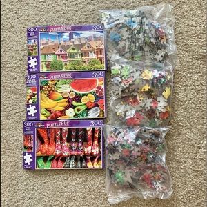 Brand new 300 piece puzzle set of three